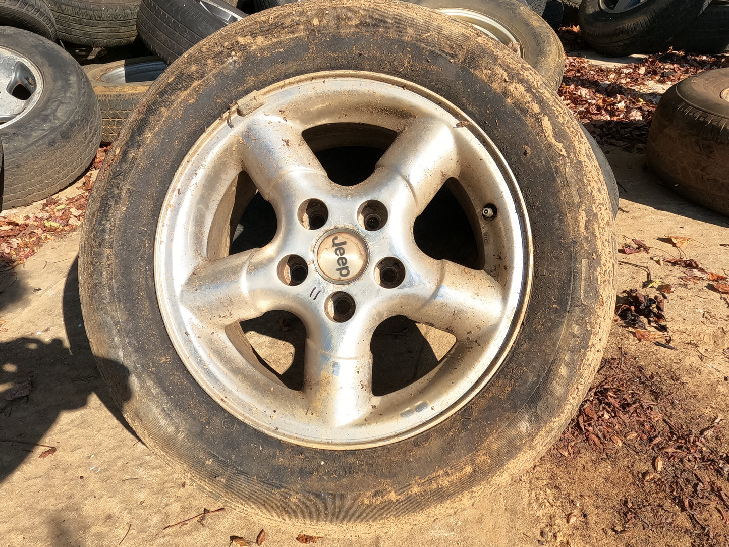 XJ or KJ wheel center caps.