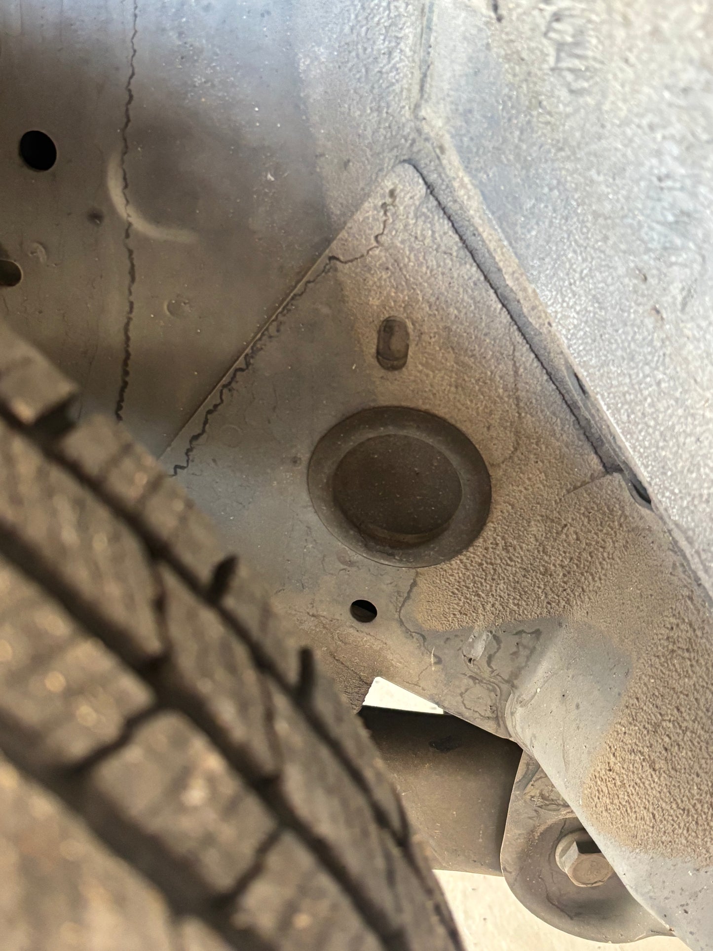 Upper Control Arm Rubber Plug. Access Hole/Hides The Bolt