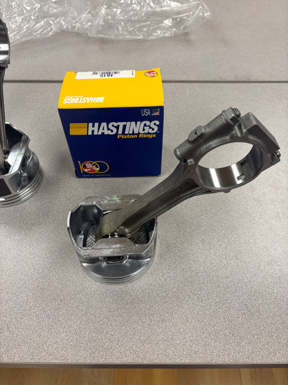 New 4.0 Pistons Pre-Assembled on Used Rods. Full Set with New Rings. New Brands Available.