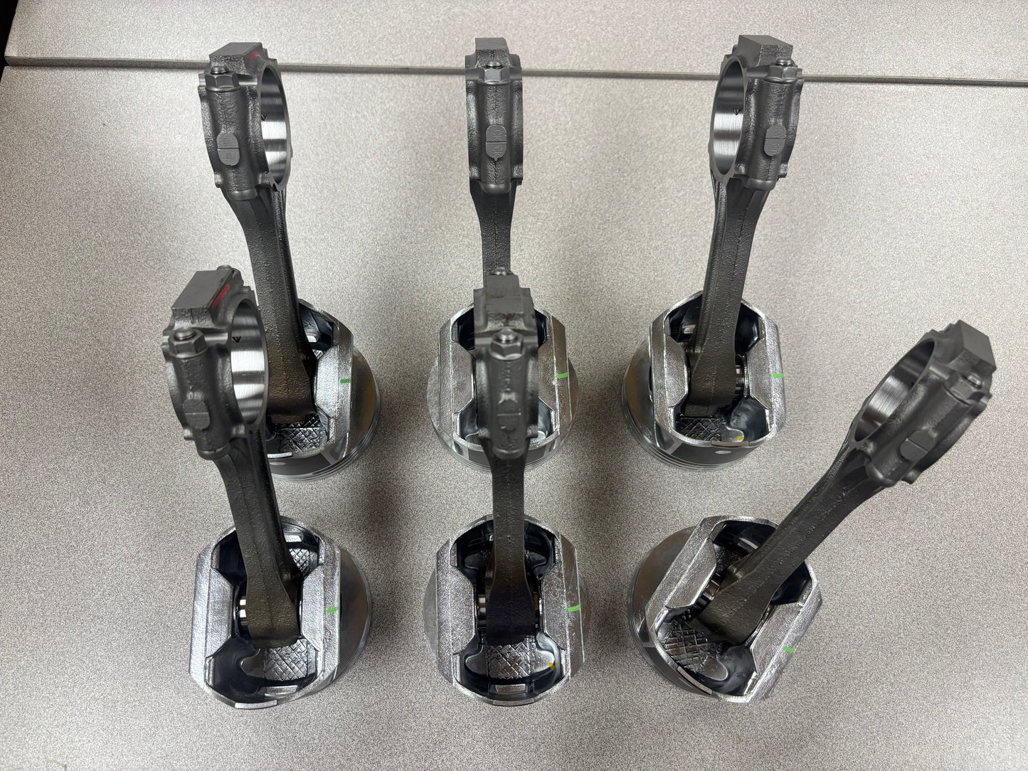 New 4.0 Pistons Pre-Assembled on Used Rods. Full Set with New Rings. New Brands Available.