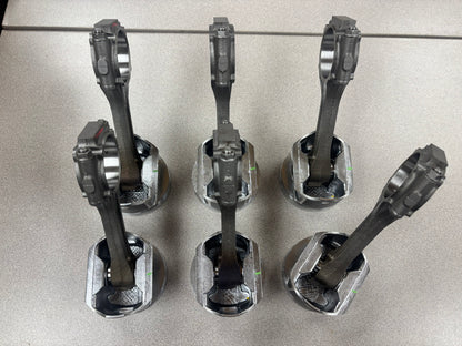 New 4.0 Pistons Pre-Assembled on Used Rods. Full Set with New Rings. New Brands Available.